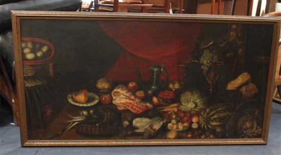 Manner of Giovanni Battista Ruoppolo (1629-1693) Still life of vegetables, meat, fruit and poultry on a table top 32 x 65in.